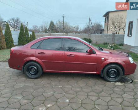 Красный Шевроле Лачетти, объемом двигателя 1.8 л и пробегом 205 тыс. км за 5600 $, фото 1 на Automoto.ua