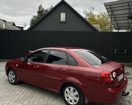 Красный Шевроле Лачетти, объемом двигателя 1.8 л и пробегом 195 тыс. км за 3700 $, фото 1 на Automoto.ua