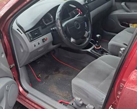 Красный Шевроле Лачетти, объемом двигателя 1.6 л и пробегом 275 тыс. км за 4500 $, фото 6 на Automoto.ua