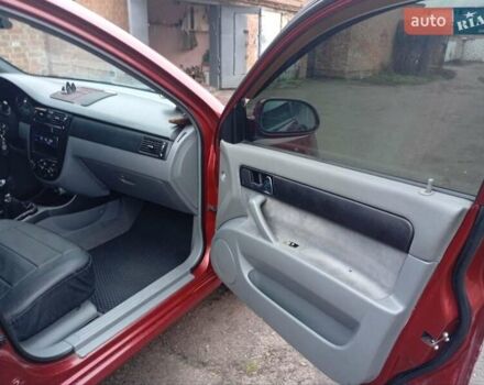 Красный Шевроле Лачетти, объемом двигателя 1.8 л и пробегом 290 тыс. км за 4100 $, фото 16 на Automoto.ua