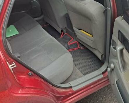 Красный Шевроле Лачетти, объемом двигателя 1.6 л и пробегом 275 тыс. км за 4500 $, фото 11 на Automoto.ua