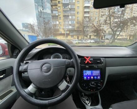 Красный Шевроле Лачетти, объемом двигателя 1.8 л и пробегом 267 тыс. км за 3999 $, фото 6 на Automoto.ua