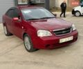 Красный Шевроле Лачетти, объемом двигателя 1.8 л и пробегом 350 тыс. км за 2250 $, фото 1 на Automoto.ua