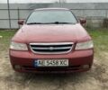 Красный Шевроле Лачетти, объемом двигателя 1.8 л и пробегом 267 тыс. км за 3999 $, фото 1 на Automoto.ua