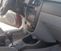Красный Шевроле Лачетти, объемом двигателя 1.8 л и пробегом 300 тыс. км за 3299 $, фото 3 на Automoto.ua