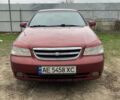 Красный Шевроле Лачетти, объемом двигателя 1.8 л и пробегом 267 тыс. км за 3500 $, фото 1 на Automoto.ua