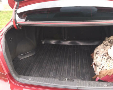 Красный Шевроле Лачетти, объемом двигателя 1.8 л и пробегом 205 тыс. км за 5600 $, фото 5 на Automoto.ua