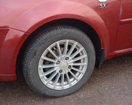 Красный Шевроле Лачетти, объемом двигателя 1.8 л и пробегом 290 тыс. км за 4100 $, фото 25 на Automoto.ua