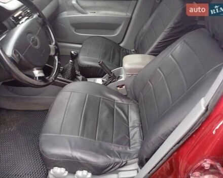 Красный Шевроле Лачетти, объемом двигателя 1.8 л и пробегом 290 тыс. км за 4100 $, фото 12 на Automoto.ua