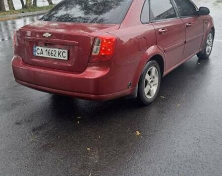 Красный Шевроле Лачетти, объемом двигателя 1.6 л и пробегом 275 тыс. км за 4500 $, фото 3 на Automoto.ua