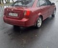 Красный Шевроле Лачетти, объемом двигателя 1.6 л и пробегом 275 тыс. км за 4500 $, фото 3 на Automoto.ua