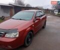 Красный Шевроле Лачетти, объемом двигателя 1.8 л и пробегом 290 тыс. км за 4100 $, фото 3 на Automoto.ua