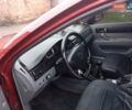 Красный Шевроле Лачетти, объемом двигателя 1.8 л и пробегом 290 тыс. км за 4100 $, фото 13 на Automoto.ua
