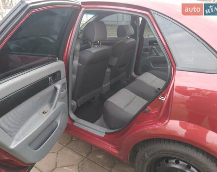 Красный Шевроле Лачетти, объемом двигателя 1.8 л и пробегом 205 тыс. км за 5600 $, фото 3 на Automoto.ua