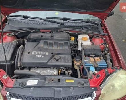 Красный Шевроле Лачетти, объемом двигателя 1.6 л и пробегом 275 тыс. км за 4500 $, фото 16 на Automoto.ua