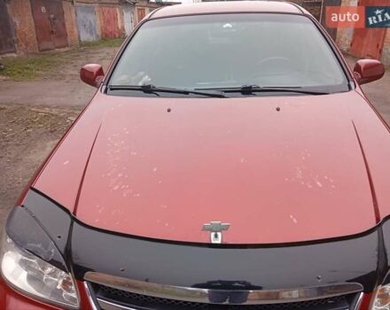 Красный Шевроле Лачетти, объемом двигателя 1.8 л и пробегом 290 тыс. км за 4100 $, фото 5 на Automoto.ua