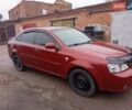 Красный Шевроле Лачетти, объемом двигателя 1.8 л и пробегом 290 тыс. км за 4100 $, фото 2 на Automoto.ua
