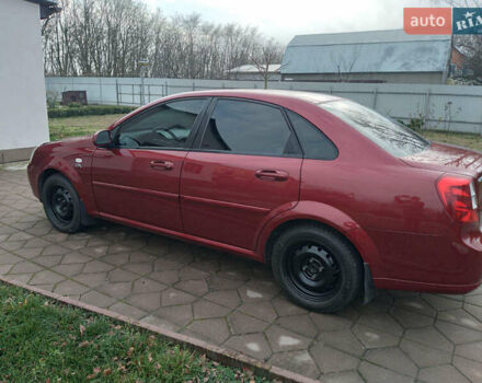 Красный Шевроле Лачетти, объемом двигателя 1.8 л и пробегом 205 тыс. км за 5600 $, фото 2 на Automoto.ua