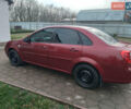 Красный Шевроле Лачетти, объемом двигателя 1.8 л и пробегом 205 тыс. км за 5600 $, фото 2 на Automoto.ua