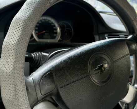 Красный Шевроле Лачетти, объемом двигателя 1.6 л и пробегом 213 тыс. км за 4500 $, фото 8 на Automoto.ua