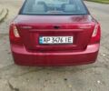 Червоний Шевроле Лачетті, об'ємом двигуна 1.8 л та пробігом 313 тис. км за 4500 $, фото 2 на Automoto.ua