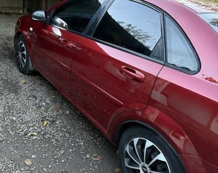 Красный Шевроле Лачетти, объемом двигателя 1.6 л и пробегом 368 тыс. км за 3300 $, фото 7 на Automoto.ua