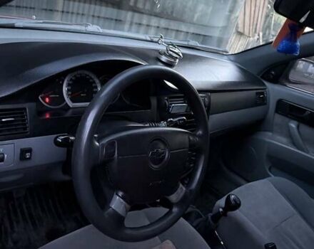 Красный Шевроле Лачетти, объемом двигателя 1.6 л и пробегом 368 тыс. км за 3300 $, фото 1 на Automoto.ua