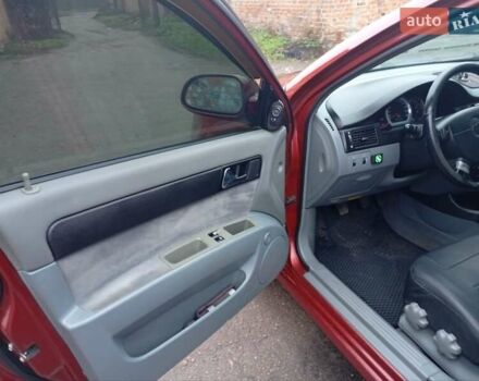 Красный Шевроле Лачетти, объемом двигателя 1.8 л и пробегом 290 тыс. км за 4100 $, фото 14 на Automoto.ua