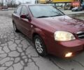 Красный Шевроле Лачетти, объемом двигателя 1.8 л и пробегом 125 тыс. км за 5600 $, фото 1 на Automoto.ua