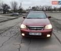 Красный Шевроле Лачетти, объемом двигателя 1.8 л и пробегом 125 тыс. км за 5600 $, фото 2 на Automoto.ua