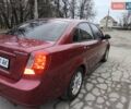 Красный Шевроле Лачетти, объемом двигателя 1.8 л и пробегом 139 тыс. км за 5300 $, фото 6 на Automoto.ua