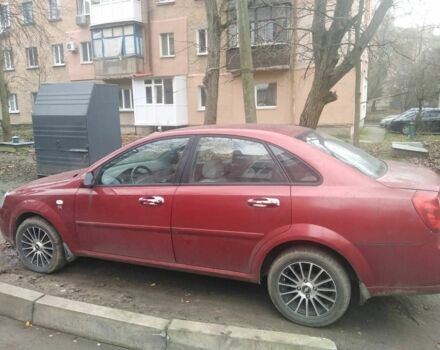 Красный Шевроле Лачетти, объемом двигателя 1.8 л и пробегом 140 тыс. км за 3250 $, фото 2 на Automoto.ua