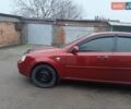 Красный Шевроле Лачетти, объемом двигателя 1.8 л и пробегом 290 тыс. км за 4100 $, фото 6 на Automoto.ua