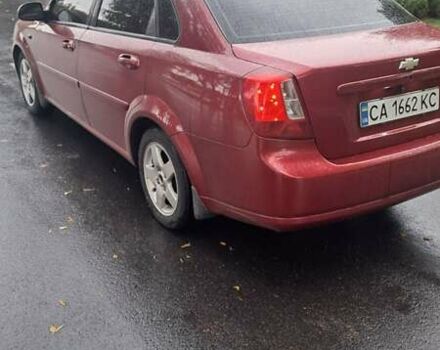 Красный Шевроле Лачетти, объемом двигателя 1.6 л и пробегом 275 тыс. км за 4500 $, фото 9 на Automoto.ua