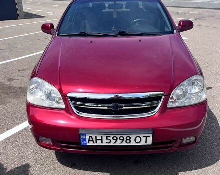 Красный Шевроле Лачетти, объемом двигателя 1.8 л и пробегом 205 тыс. км за 4650 $, фото 1 на Automoto.ua