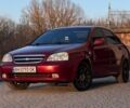 Червоний Шевроле Лачетті, об'ємом двигуна 1.8 л та пробігом 318 тис. км за 3700 $, фото 1 на Automoto.ua
