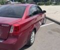 Красный Шевроле Лачетти, объемом двигателя 1.8 л и пробегом 205 тыс. км за 4300 $, фото 2 на Automoto.ua