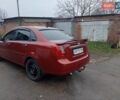 Красный Шевроле Лачетти, объемом двигателя 1.8 л и пробегом 290 тыс. км за 4100 $, фото 7 на Automoto.ua