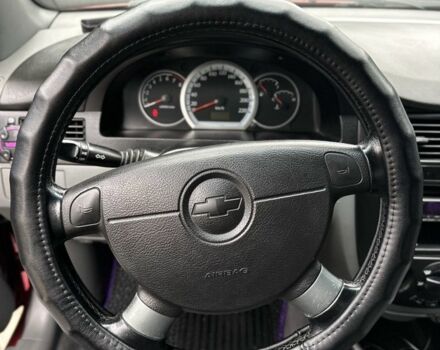 Красный Шевроле Лачетти, объемом двигателя 1.8 л и пробегом 195 тыс. км за 3700 $, фото 7 на Automoto.ua