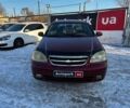 Красный Шевроле Лачетти, объемом двигателя 1.8 л и пробегом 315 тыс. км за 4490 $, фото 1 на Automoto.ua