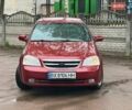Червоний Шевроле Лачетті, об'ємом двигуна 1.8 л та пробігом 305 тис. км за 3499 $, фото 7 на Automoto.ua