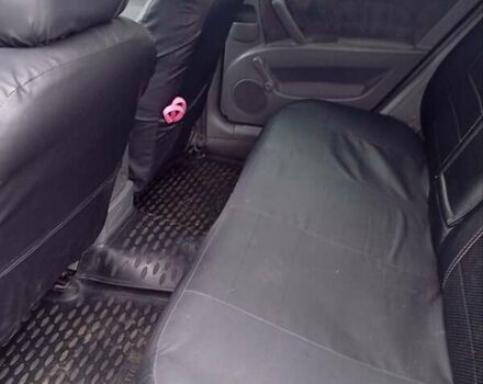 Красный Шевроле Лачетти, объемом двигателя 1.8 л и пробегом 290 тыс. км за 4100 $, фото 21 на Automoto.ua