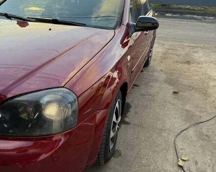 Красный Шевроле Лачетти, объемом двигателя 1.6 л и пробегом 368 тыс. км за 3300 $, фото 4 на Automoto.ua