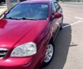 Красный Шевроле Лачетти, объемом двигателя 1.8 л и пробегом 205 тыс. км за 4650 $, фото 1 на Automoto.ua