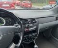 Красный Шевроле Лачетти, объемом двигателя 1.8 л и пробегом 194 тыс. км за 4200 $, фото 4 на Automoto.ua