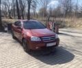 Красный Шевроле Лачетти, объемом двигателя 1.8 л и пробегом 238 тыс. км за 4550 $, фото 1 на Automoto.ua