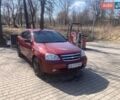 Красный Шевроле Лачетти, объемом двигателя 1.8 л и пробегом 238 тыс. км за 4650 $, фото 1 на Automoto.ua