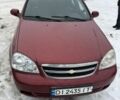 Красный Шевроле Лачетти, объемом двигателя 1.8 л и пробегом 330 тыс. км за 3300 $, фото 1 на Automoto.ua