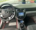 Красный Шевроле Лачетти, объемом двигателя 1.6 л и пробегом 212 тыс. км за 4600 $, фото 3 на Automoto.ua