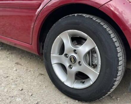 Красный Шевроле Лачетти, объемом двигателя 1.6 л и пробегом 130 тыс. км за 6200 $, фото 21 на Automoto.ua